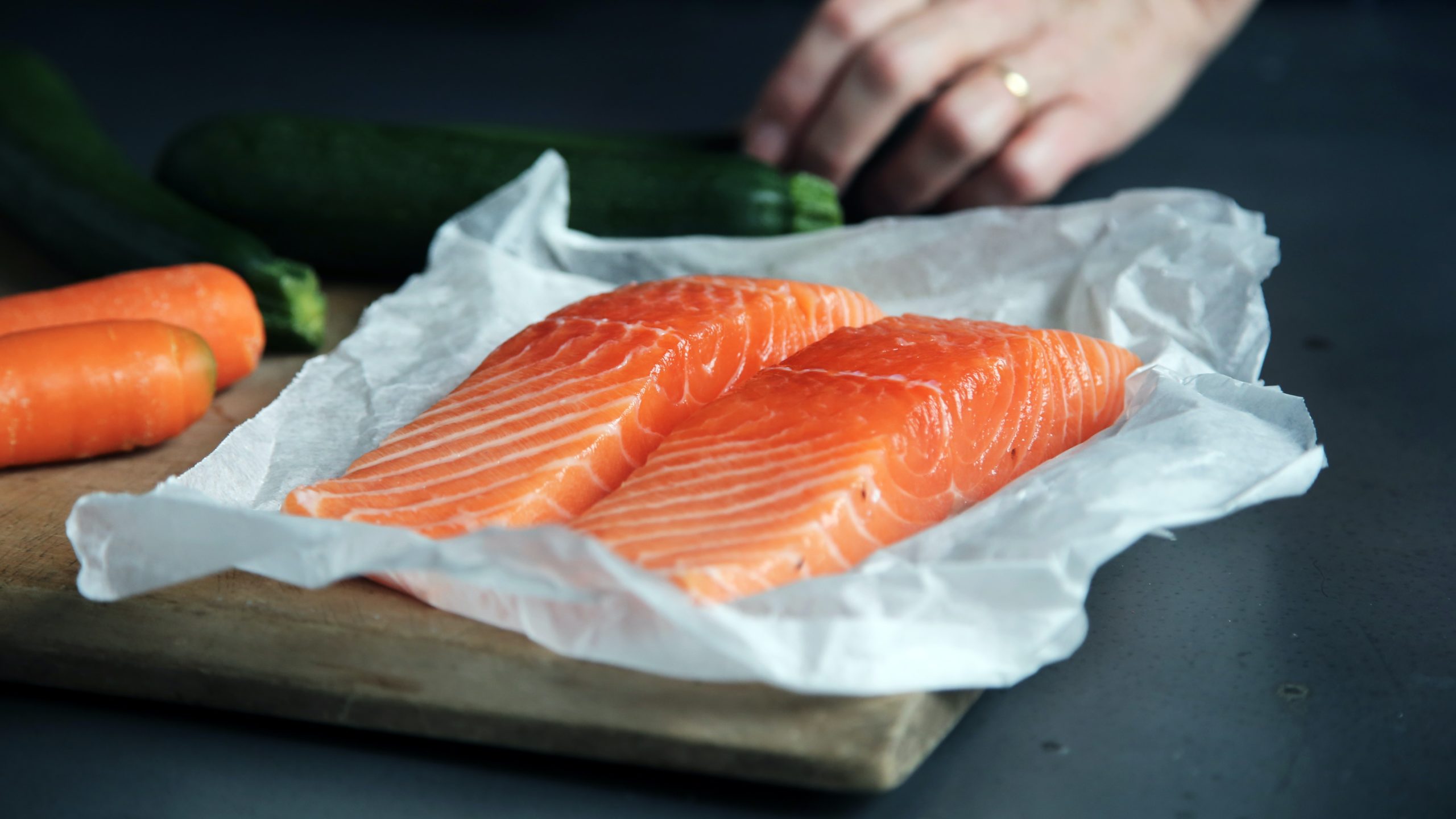 photo-1499125562588-29fb8a56b5d5 Two salmon steaks. Salmon is a great source of B vitamins, including B6, B9 and B12. Image from Unsplash.